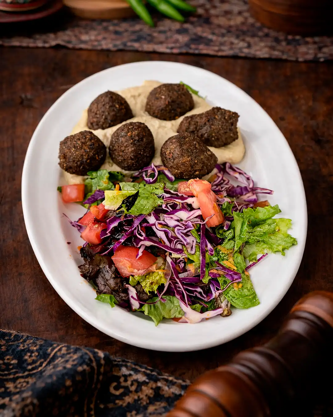 Crispy chickpea patties served with tahini and hummus.
